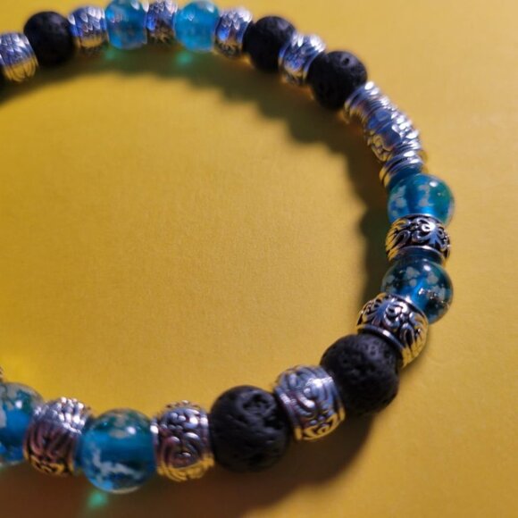 NWT Mens Glow In The Dark Stretch Bracelet. Black Lava Rock Blue Firefly Glass - Picture 10 of 11